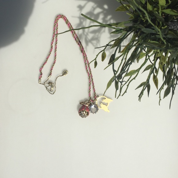 Juicy Couture long bird necklace.