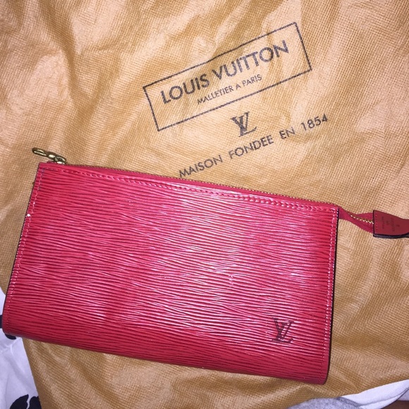 Red vintage Louis Vuitton bamboo clutch