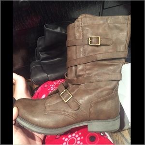 Combat boots with straps and buckles