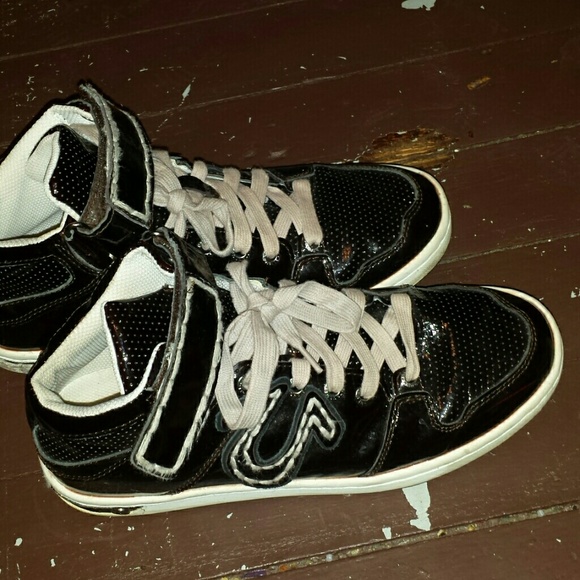 Maroon colored sneakers