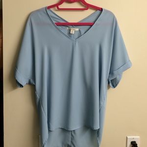 Light blue V neck top, 100% polyester