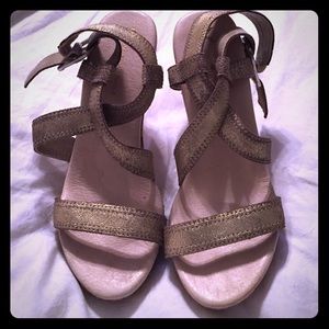 American eagle gold cork bottom heals. Worn once.