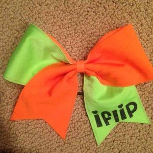 Yellow and orange cheer bow