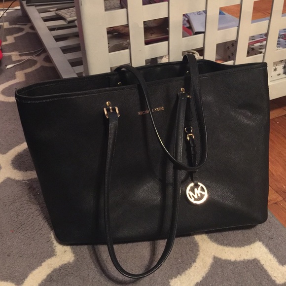 Michael Kors "Apple" laptop bag.