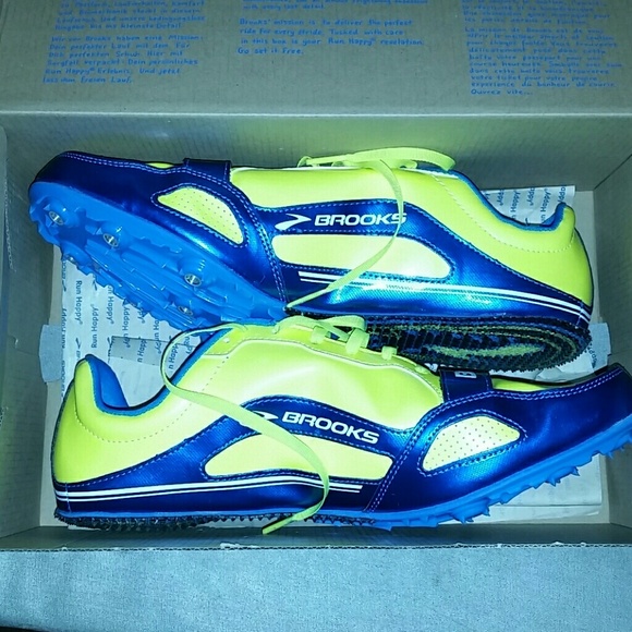 Mens track sneakers. NEVER WORN