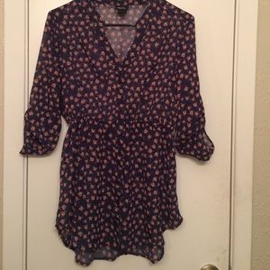 Navy blue rose pattern flowy top.