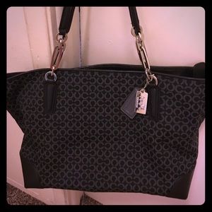 Black and silver Coach purse