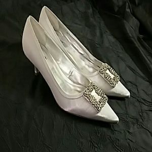 White satin kitten heeled wedding shoes