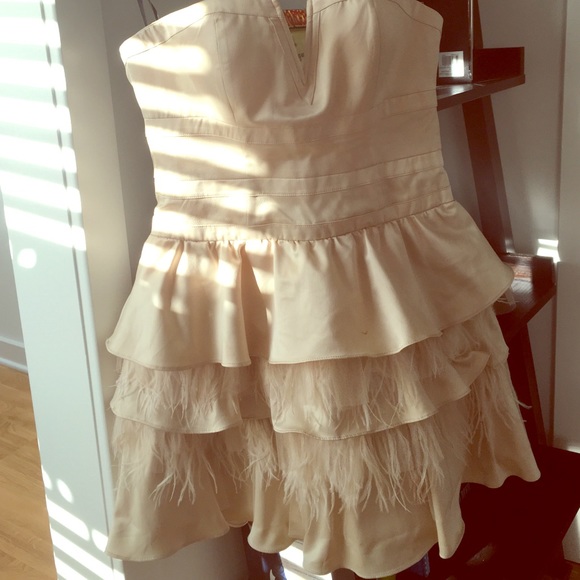 Strapless mini Gold color dress with light Ruffles