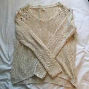 Cream sweater with studded shoulders