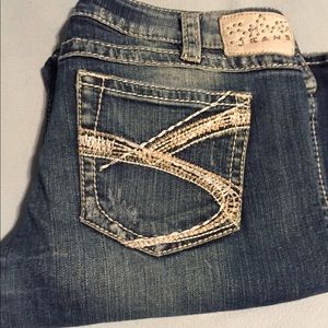 Women's silver twisted jeans 31w31L