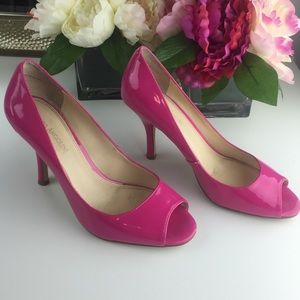Hot pink peep toe pumps