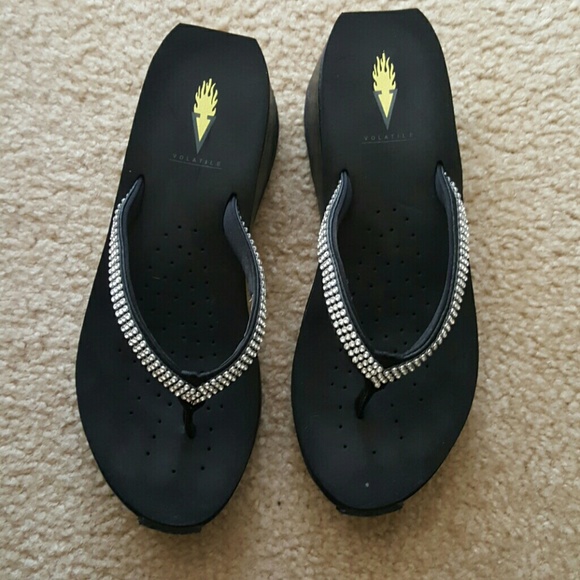 Volatile  wedge flip flops