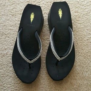 Volatile  wedge flip flops