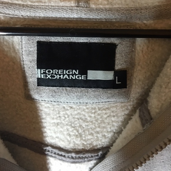 Cute, fuzzy Foreign Exchange zip up!