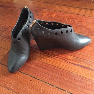 Rowen black leather ankle booties.