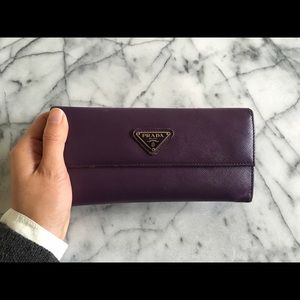 Prada continental envelope wallet.