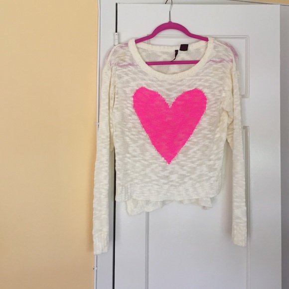 white sweater with pink hearts