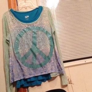 I am selling a Nice shirt from justice.