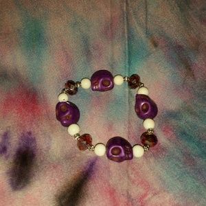 Stretchy purple skull beaded bracelet