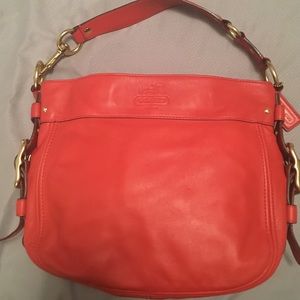 Burnt orange/red leather coach purse