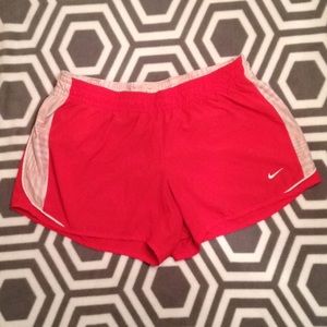 Pink Nike running shorts