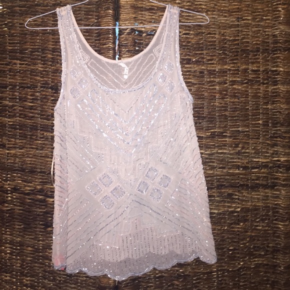 Sheer top with light blue and pink bead detail