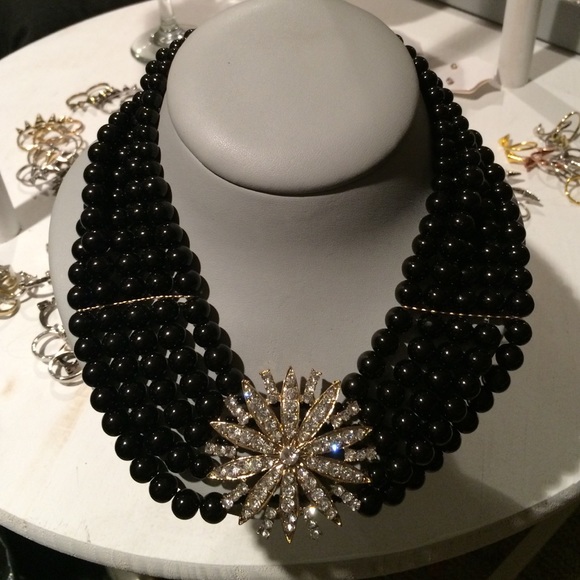 Multi layer black bead necklace with jewel burst