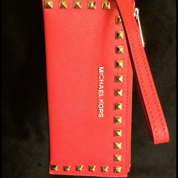 Michael Kors "Bedford" orange studded wristlet