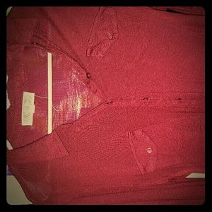 Maroon button up blouse.