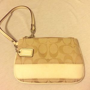 Coach wristlet purse in cream and tan