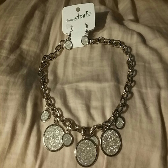 Silver necklace and earring set