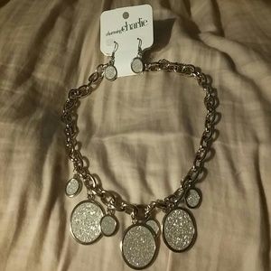 Silver necklace and earring set