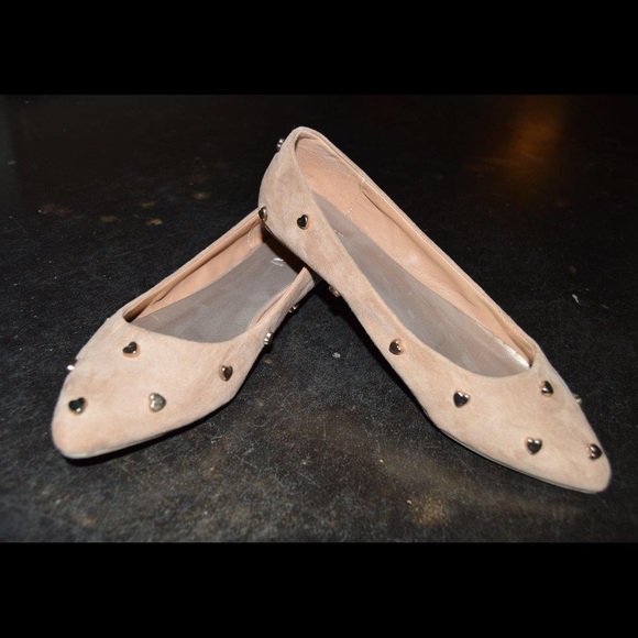 Nude sued flats with gold heart embellishments