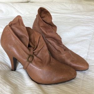 Nine West booties with heels.