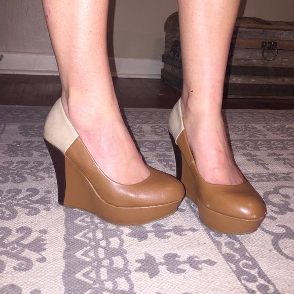 Like brown, tan, and dark brown closed toe wedge