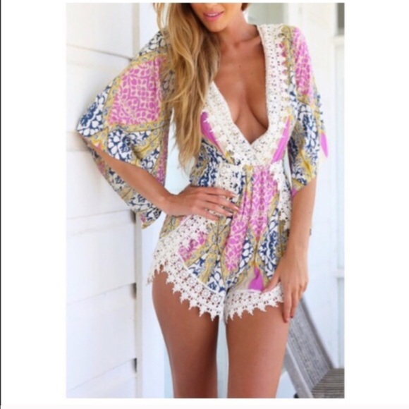 Free spirit flirty romper with deep v