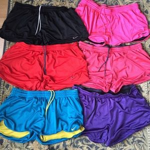 Six pairs of Nike dri-fit shorts