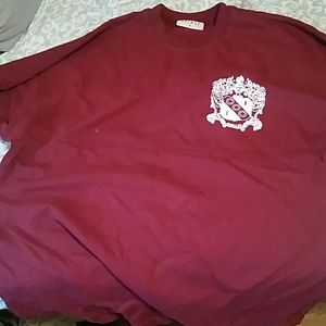 Maroon spirit jersey. BRAND NEW. AGD