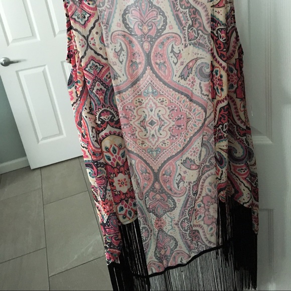 sleeveless coverup to wear over tanks.