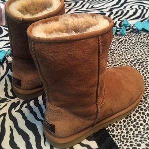 Tan, half sized UGG boots