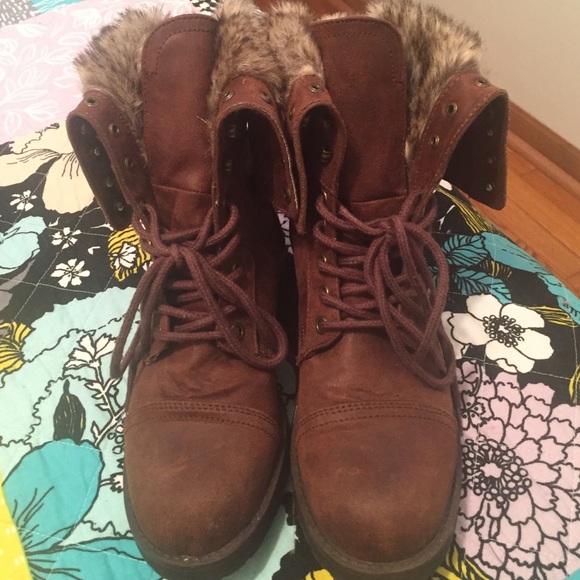 Super cute brown combat boots with the fur.