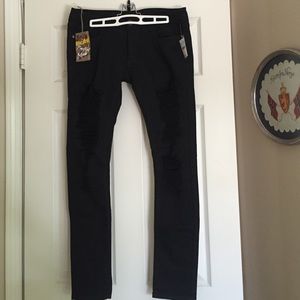 Black ripped "Machine" brand skinny jeans