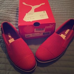 Puma brand new! Size 7 Women's.  Black and red.