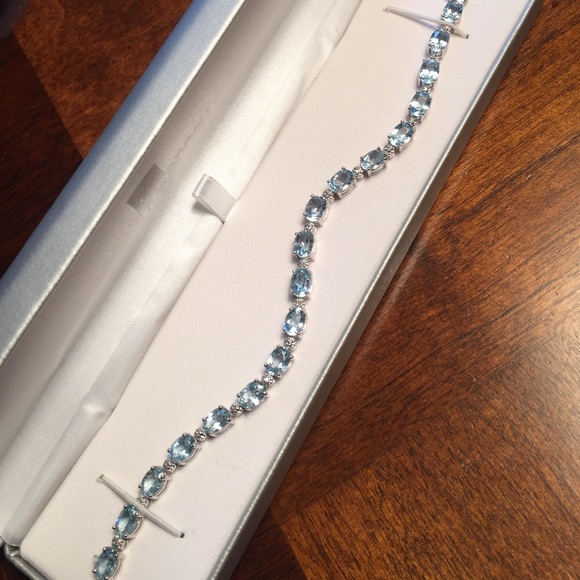 Brand new blue topaz & diamond accent bracelet!