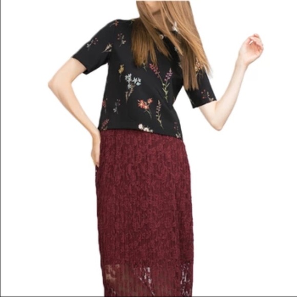 New. Pretty floral chiffon top.