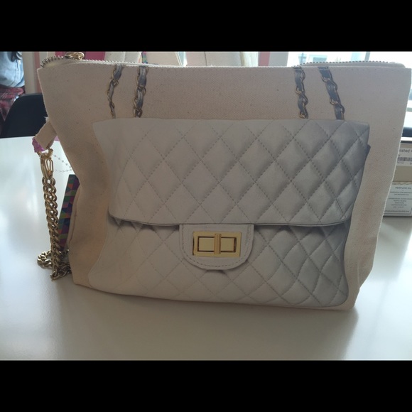 Thursday Friday clutch with hand chain in gold