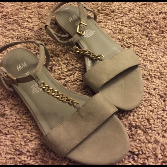Gray and gold sandals