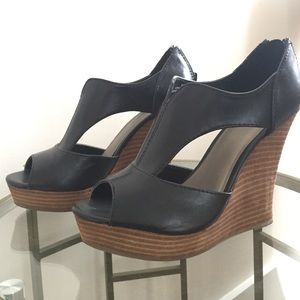 Sky high black wedges!