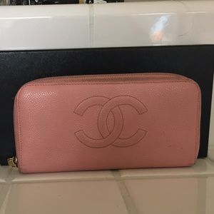 Chanel pink wallet.